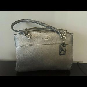 Coach purse with body strap included